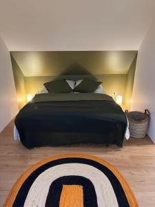 Rúm í herbergi á Gîte Traou Nod