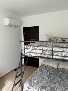 Postel nebo postele na pokoji v ubytování Appartement de standing Résidence Kariat Cabo + 17 fotografií