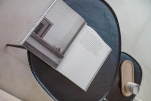 a book sitting on top of a table at Nima Residences in Paleros