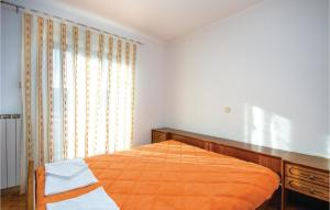 Posteľ alebo postele v izbe v ubytovaní 3 Bedroom Nice Apartment In Cavle