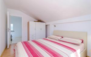 Postel nebo postele na pokoji v ubytování Two-Bedroom Holiday Home In Opuzen