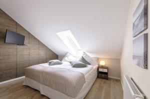 Katil atau katil-katil dalam bilik di Seebadquartier - Ihr Rückzugsort zwischen Ostsee und Bodden