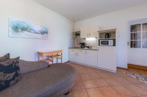 Η κουζίνα ή μικρή κουζίνα στο Muschelremise - im Herzen der Warener Innenstadt