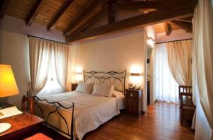 Postel nebo postele na pokoji v ubytování Relais Casa Orter + 37 fotografií