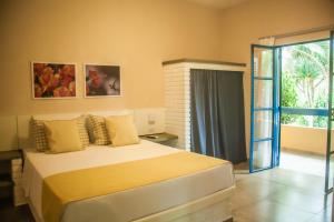 Postel nebo postele na pokoji v ubytování Matiz Igaratá Resort, Spa e Eventos