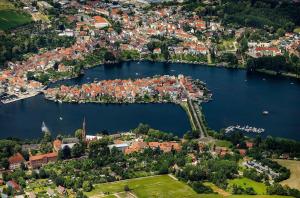 an aerial view of a town next to a lake at StadtApartment im Luftkurort Malchow in Malchow