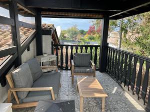 Balkón nebo terasa v ubytování Les Chambres de L'ARESTEL