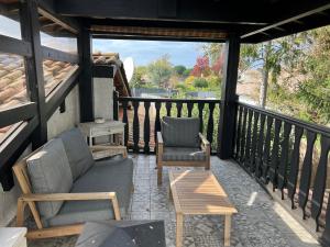 Balkón nebo terasa v ubytování Les Chambres de L'ARESTEL