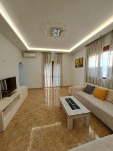 A television and/or entertainment centre at Olmar's Guest House