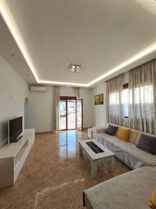 A television and/or entertainment centre at Olmar's Guest House