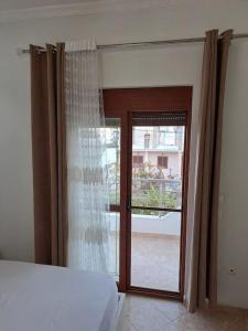 A bed or beds in a room at Olmar's Guest House