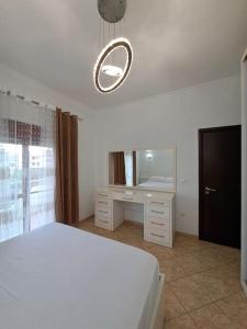 A bed or beds in a room at Olmar's Guest House