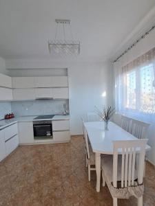 A kitchen or kitchenette at Olmar's Guest House