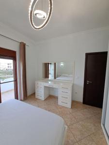 A bed or beds in a room at Olmar's Guest House
