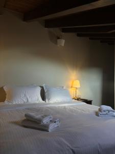 Postel nebo postele na pokoji v ubytování Guesthouse Lousios