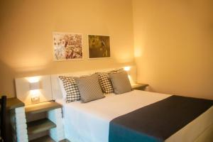 Postel nebo postele na pokoji v ubytování Matiz Igaratá Resort, Spa e Eventos