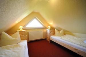 Ένα ή περισσότερα κρεβάτια σε δωμάτιο στο Hus Utblick 8B