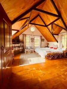 Postel nebo postele na pokoji v ubytování Stumpfields