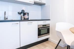 Η κουζίνα ή μικρή κουζίνα στο New Kitchen, Vibrant Home Close To Supermarket
