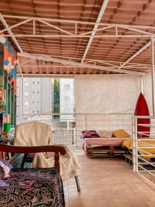 Postel nebo postele na pokoji v ubytování Aloha Oe Itaguá