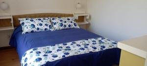 Postel nebo postele na pokoji v ubytování Bayti Hostal + 7 fotografií