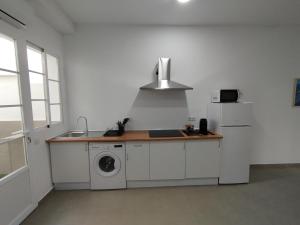 Kuchyň nebo kuchyňský kout v ubytování Apartamentos Lucia Algodonales
