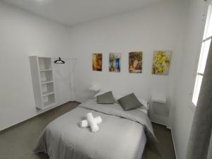 Postel nebo postele na pokoji v ubytování Apartamentos Lucia Algodonales