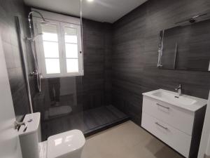 Koupelna v ubytování Apartamentos Lucia Algodonales