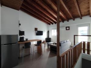 TV a/nebo společenská místnost v ubytování Apartamentos Lucia Algodonales