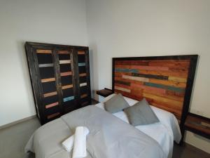 Postel nebo postele na pokoji v ubytování Apartamentos Lucia Algodonales
