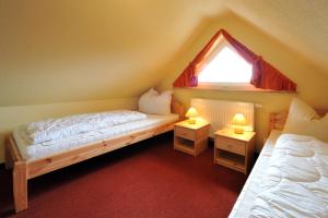 Ένα ή περισσότερα κρεβάτια σε δωμάτιο στο Hus Utblick 8A