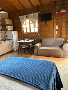 Køkken eller tekøkken på RESIDENCIAL MARÉ ALTA-CABANA 1-PRAIA DO ROSA/SC