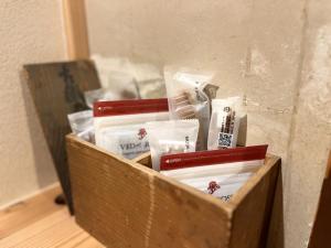 a wooden box filled with packets of food at quolo - Vacation STAY 88953v in Tamba-sasayama +2 photos