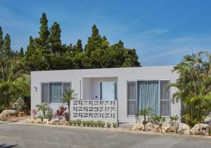 a rendering of a white house with trees at Villa Oloo - Vacation STAY 44072v in Karimata