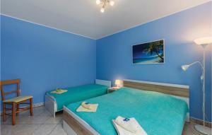 Posteľ alebo postele v izbe v ubytovaní Beautiful Apartment In Pula With Wifi