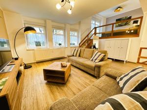 Galerie-Ferienwohnung "Im Schindlershof" - zentral und ruhigにあるシーティングエリア