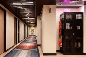 a corridor of a building with a hallway at Moxy Miami Wynwood in Miami