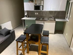 Kuchyň nebo kuchyňský kout v ubytování Appartement 8 - Hyper centre - 1 à 6 personnes