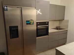 Η κουζίνα ή μικρή κουζίνα στο Apartment in the Center of OId Town