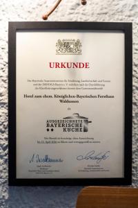 Certifikát, hodnocení, plakát nebo jiný dokument vystavený v ubytování Hotel zum ehem. königl. Bayr. Forsthaus