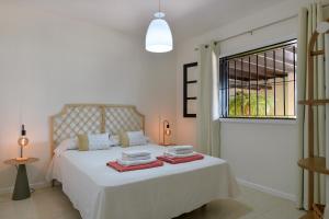 Postel nebo postele na pokoji v ubytování Casa Maresia, Playa Bastian