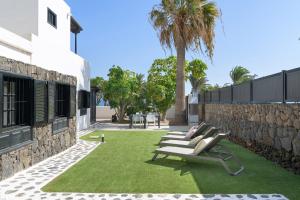 Zahrada ubytování Casa Maresia, Playa Bastian