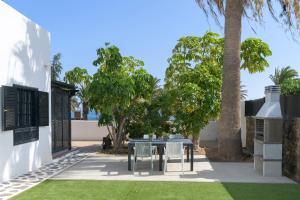Zahrada ubytování Casa Maresia, Playa Bastian