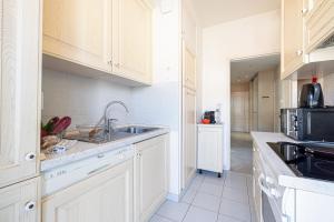 Kuchyň nebo kuchyňský kout v ubytování Victoria Bergamote Attic - Happy Rentals + 30 fotografií