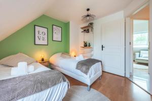 Postel nebo postele na pokoji v ubytování Le Serenity - Maison proche Gare