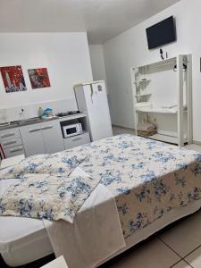 Kuchyň nebo kuchyňský kout v ubytování Kitnet 1 mobiliada no centro de Torres a 600m da Praia Grande