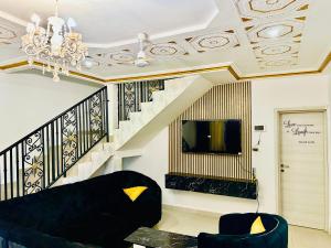 Телевизор и/или развлекательный центр в Villa Amina