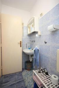 Kuchyň nebo kuchyňský kout v ubytování Apartments Mat