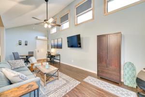 a living room with a couch and a table at Old Forge Studio: Close to Lakes & Hiking Trails in Old Forge