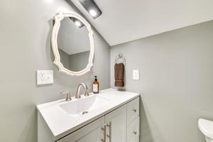 a bathroom with a sink and a mirror at Old Forge Studio: Close to Lakes & Hiking Trails in Old Forge +16 photos